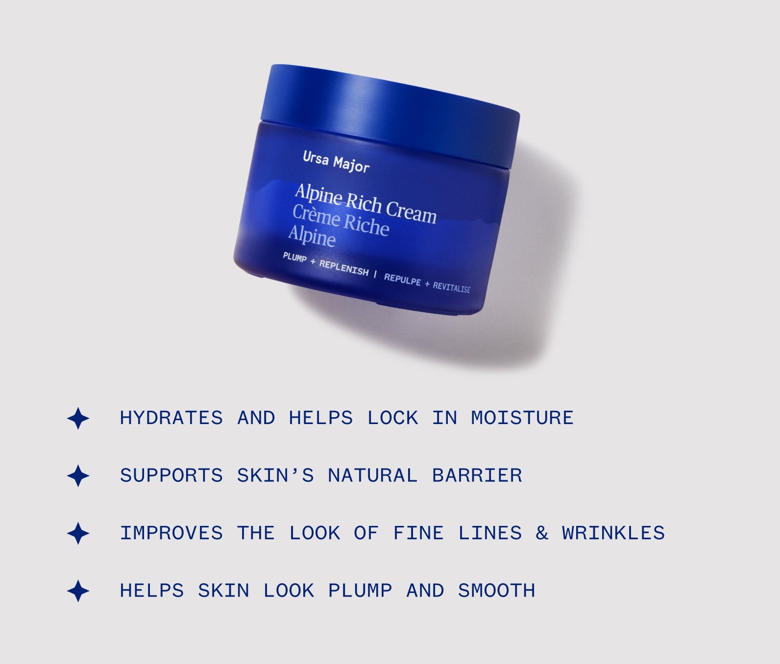 Blue jar of Ursa Major Alpine Rich Cream on a light gray background with product features listed: Hydrates and helps lock in moisture; Supports skin's natural barrier; Improves the look of fine lines and wrinkles; Helps skin look plump and smooth