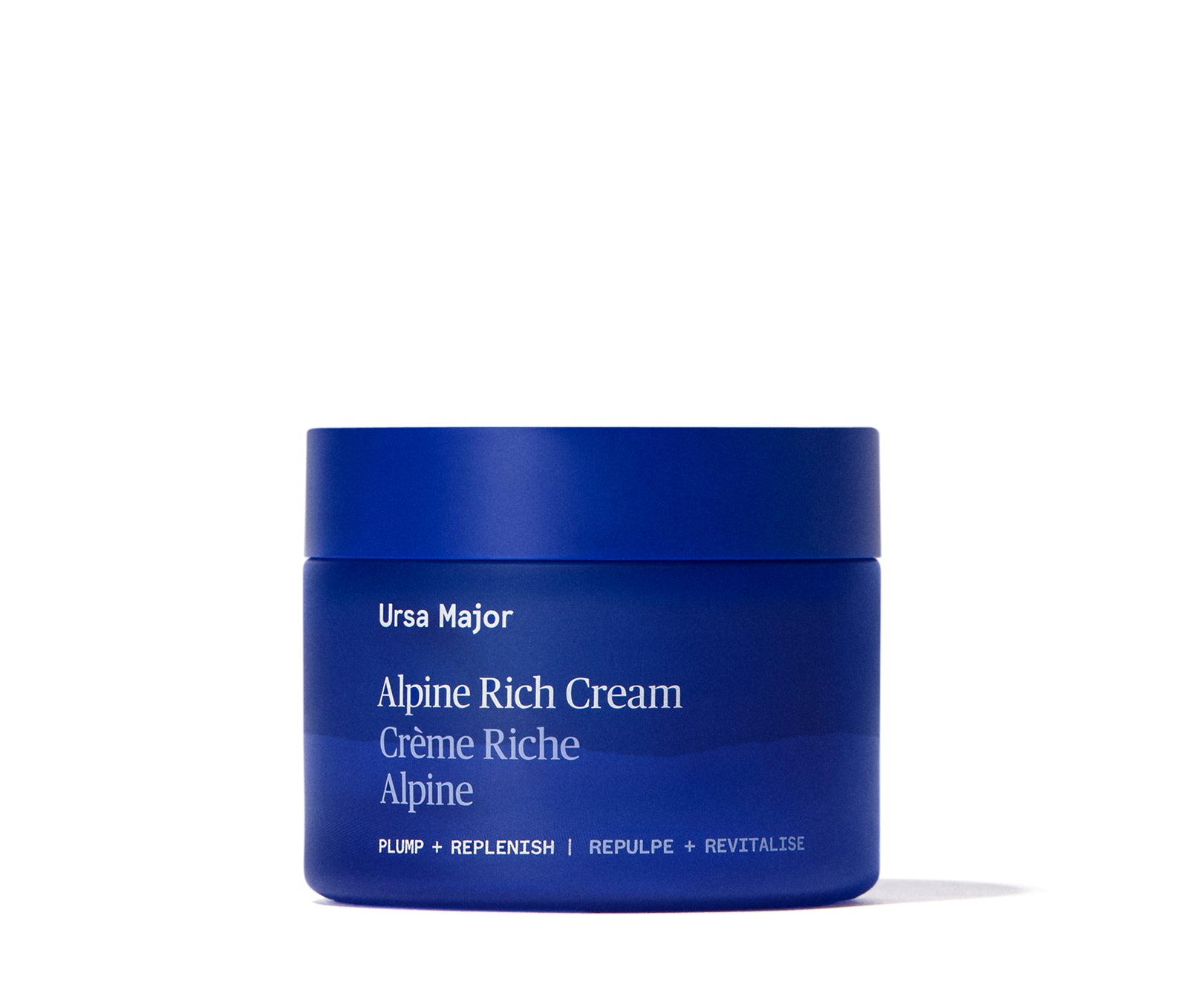 Blue jar of sealed Ursa Major Alpine Rich Cream on a white background