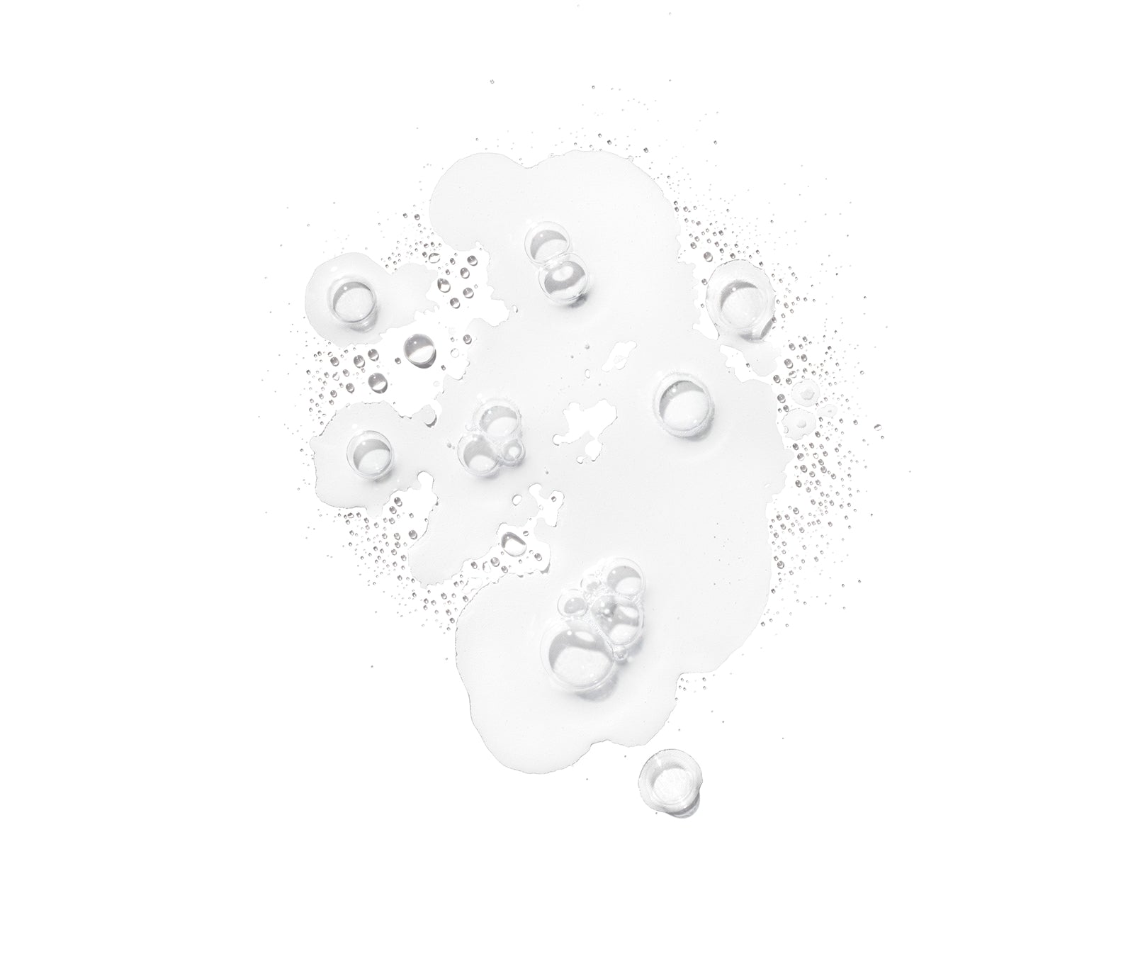 Clear tonic liquid with tiny bubbles on a white background
