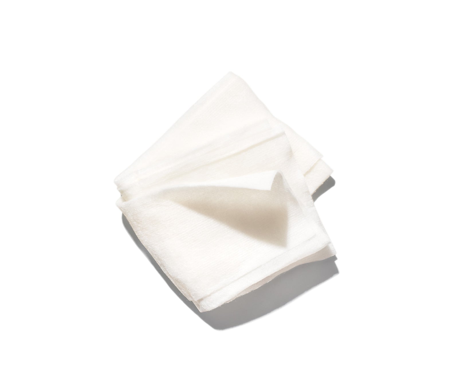 White folded face wipe on a white background