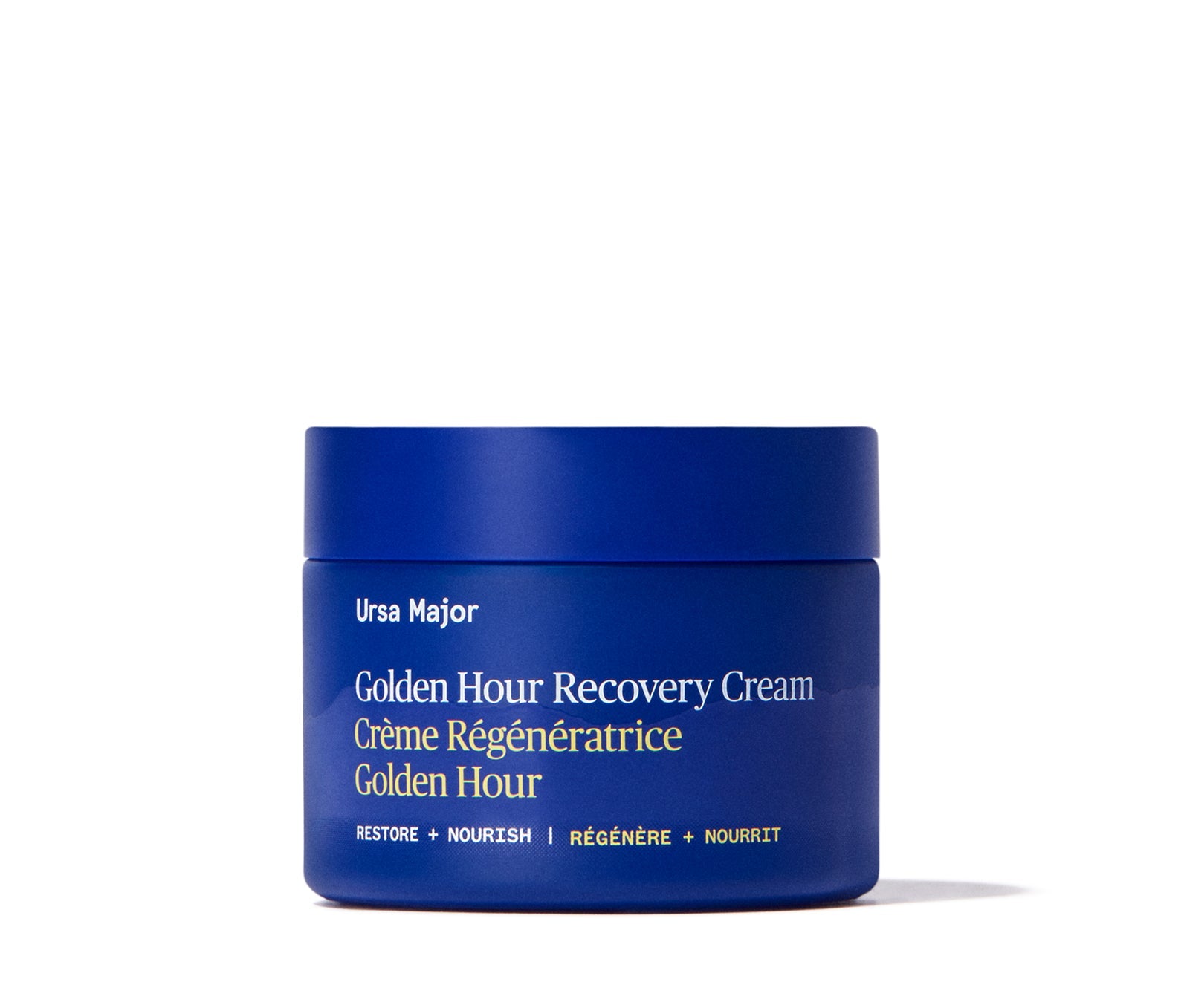 Sealed blue jar of Ursa Major Golden Hour Recovery Cream on a white background