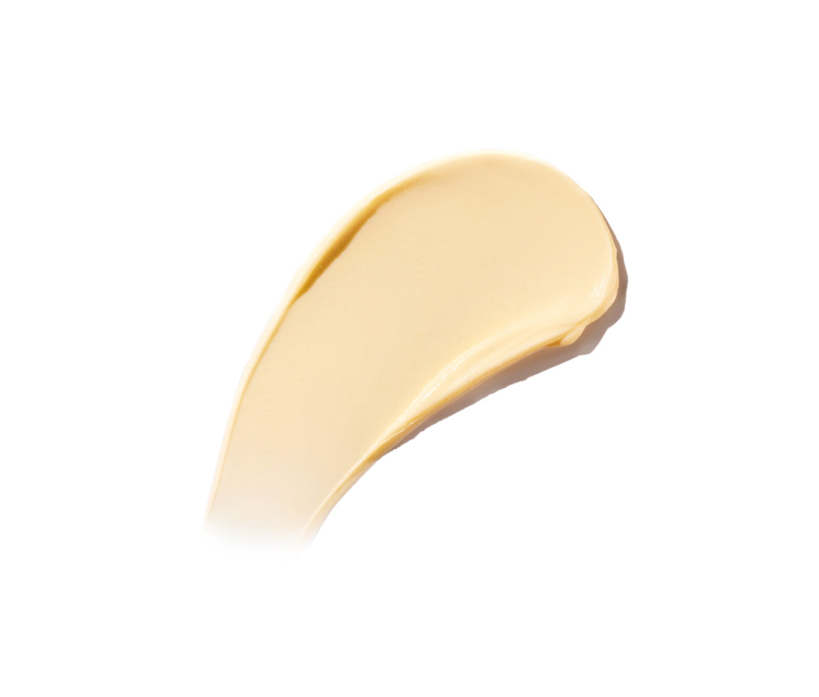 Golden-hued cream swatch on a white background