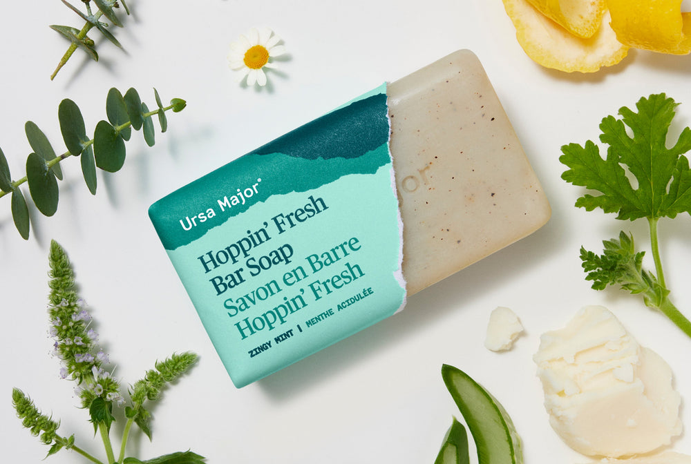Ursa Major Hoppin' Fresh Bar Soap on a white background with greenery
