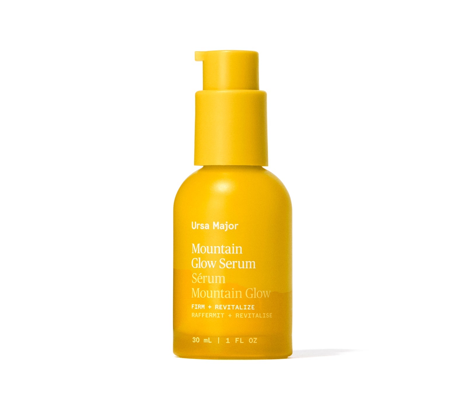 Yellow bottle of Ursa Major Mountain Glow Serum on a white background