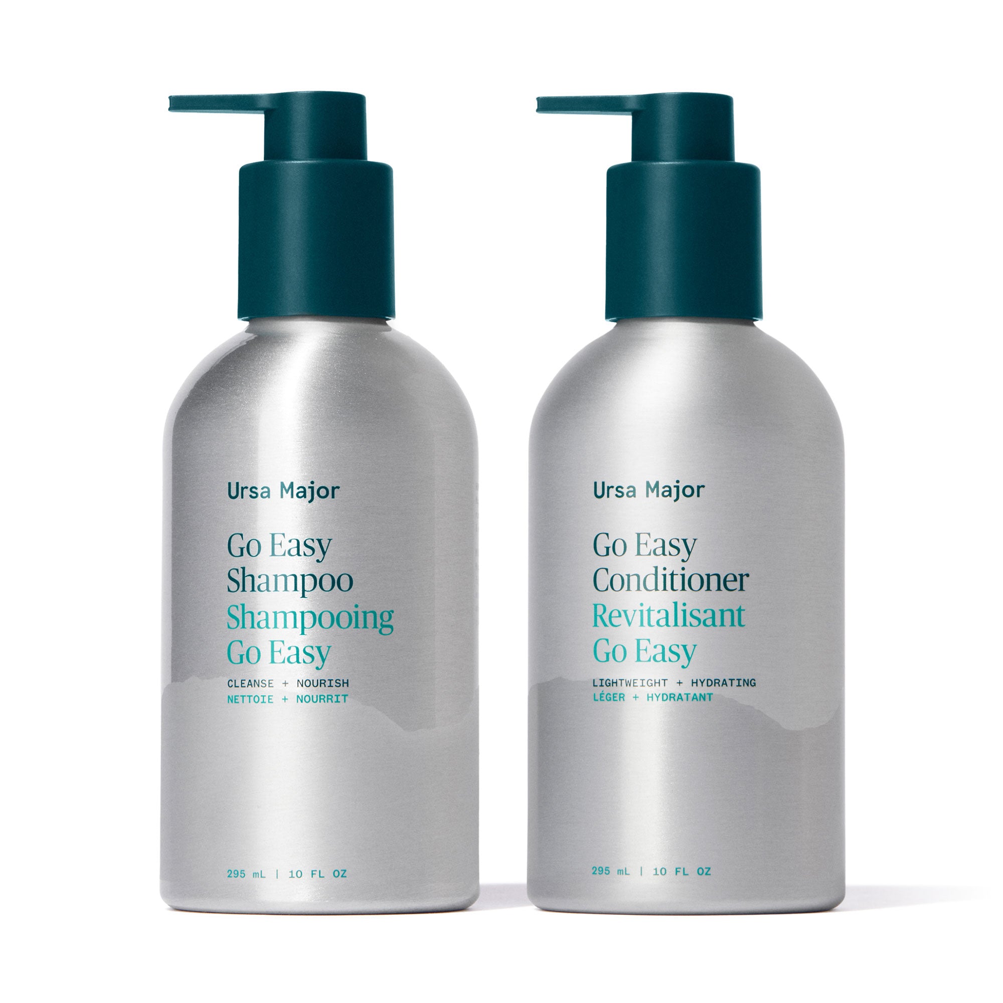 Aluminum bottles of Ursa Major Go Easy Shampoo and Conditioner bottles on a white background