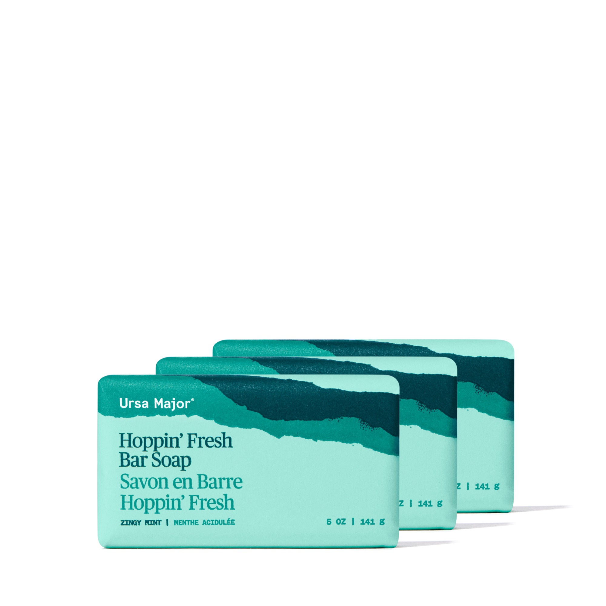 Three bars of Ursa Major Hoppin' Fresh Bar Soap on a white background