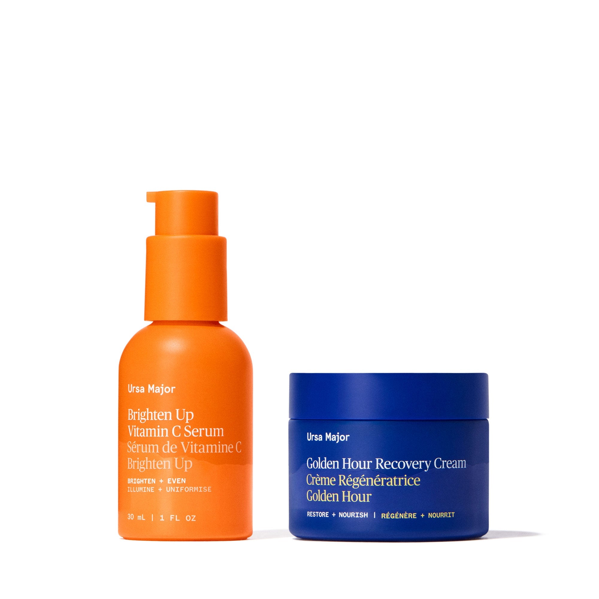 Orange Brighten Up Vitamin C Serum bottle and blue Golden Hour Recovery Cream jar on a white background