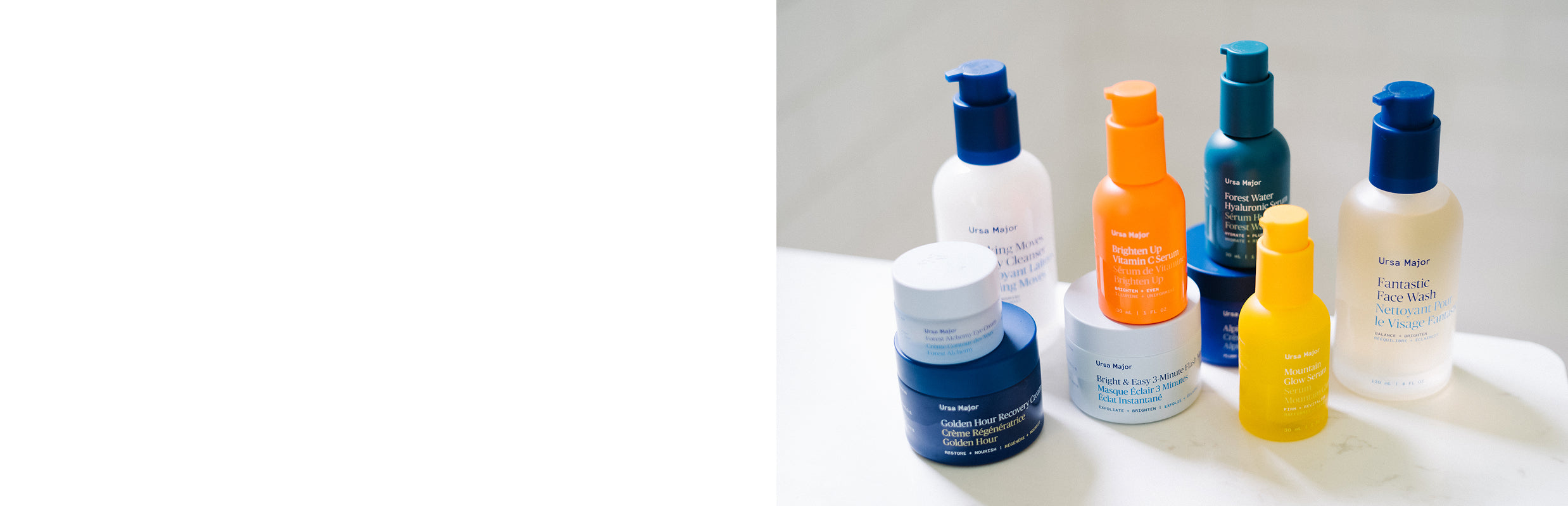 Four Ursa Major skincare products on a wooden surface with a white background