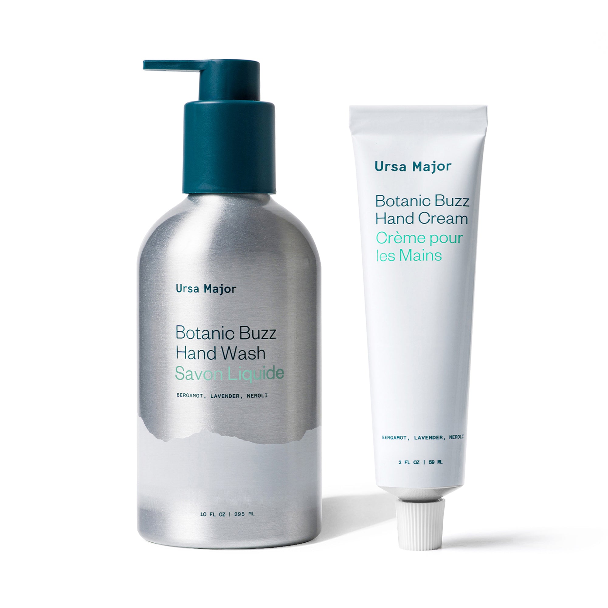 Aluminum bottle of Ursa Major Botanic Buzz Hand Wash next to white tube of Botanic Buzz Hand Cream on a white background