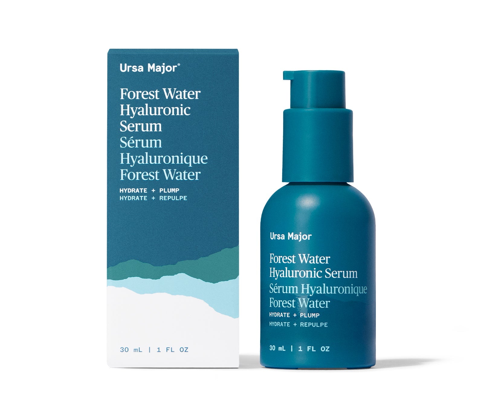 Bottle of Ursa Major Forest Water Hyaluronic Serum next to the box of Forest Water Hyaluronic Serum on a white background. Jar is a dark teal-blue with white lettering. The box is a dark-teal with white and blue mountains and white lettering.