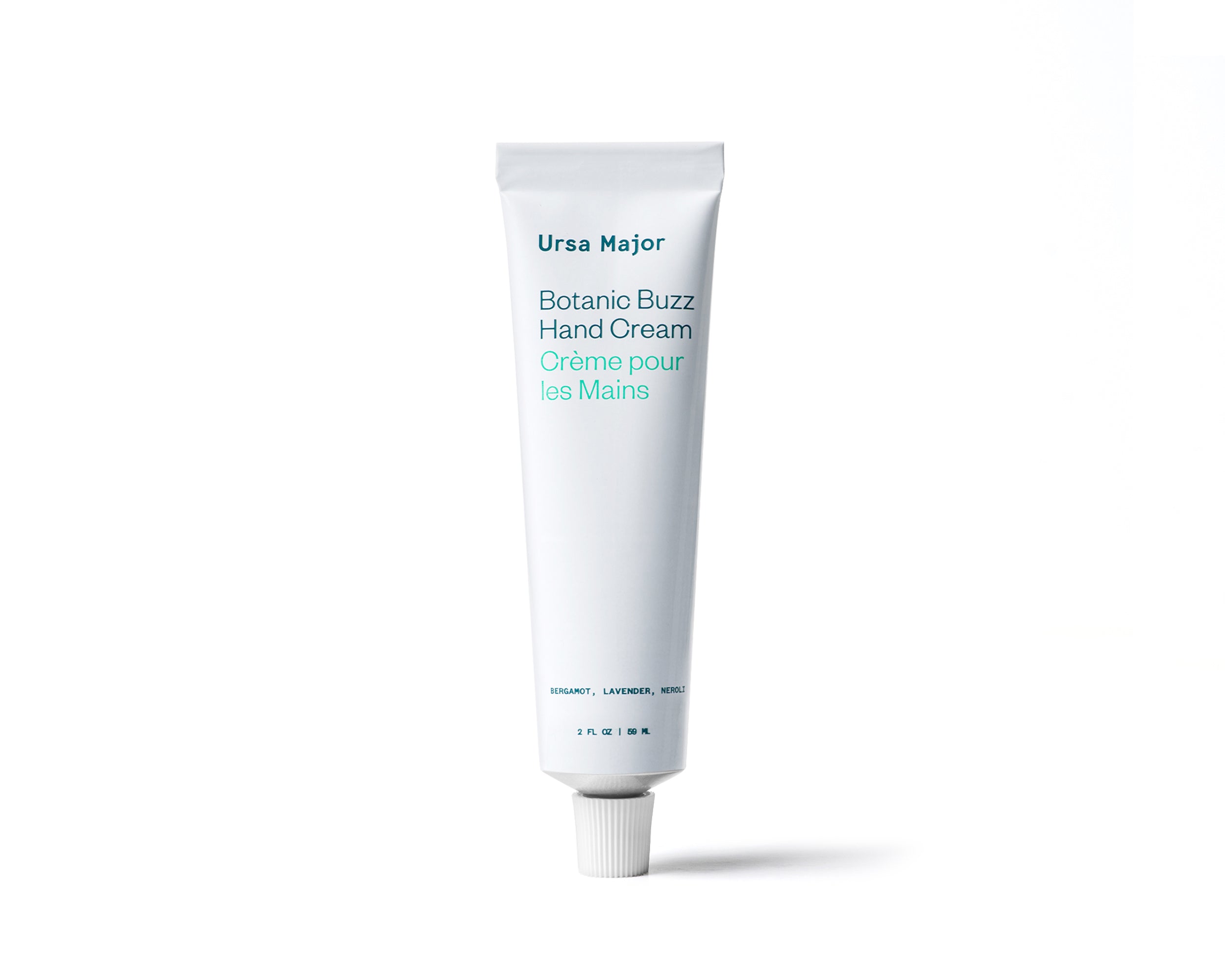 White aluminum tube of Ursa Major Botanic Buzz Hand Cream tube on a white background