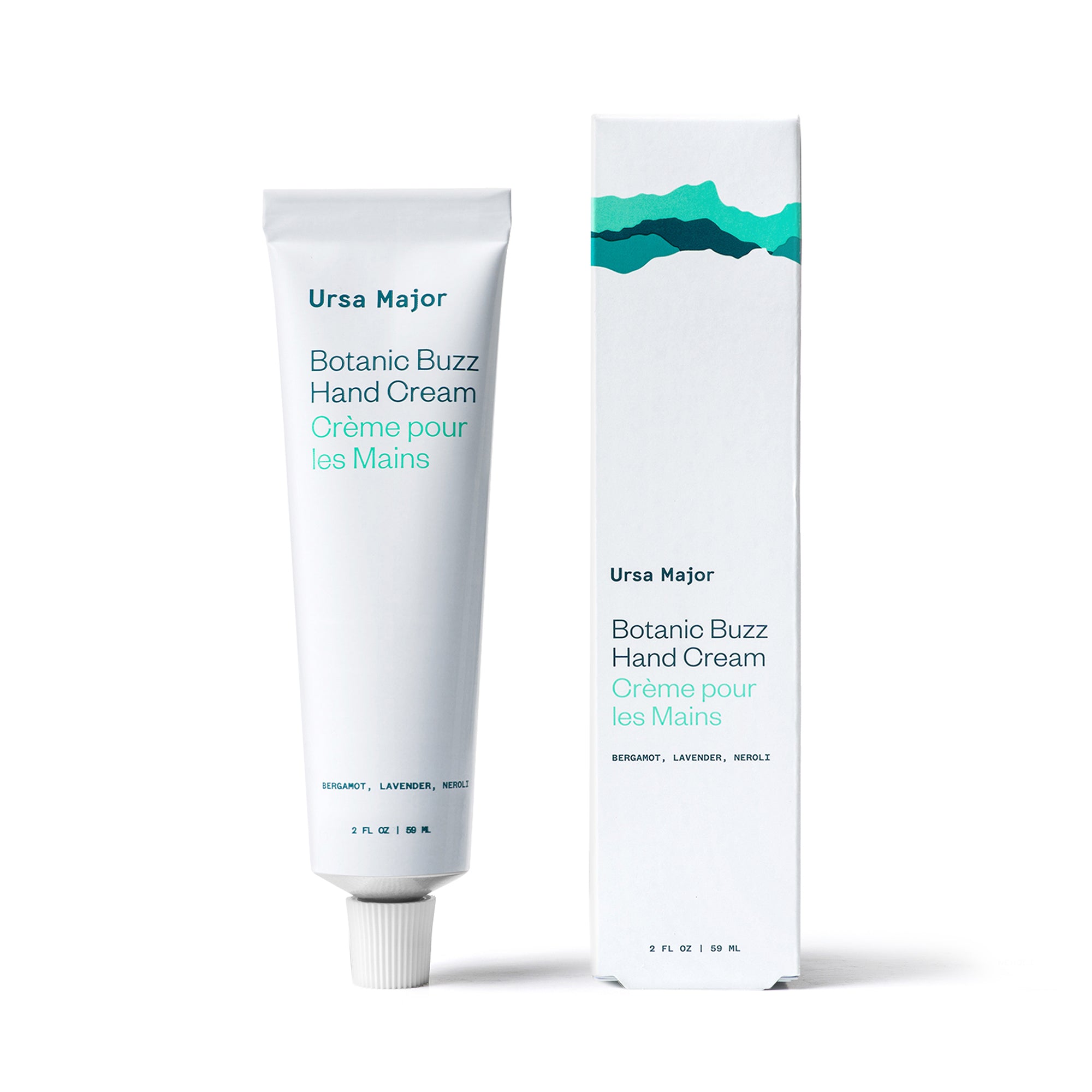 White aluminum tube of Ursa Major Botanic Buzz Hand Cream with packaging on a white background