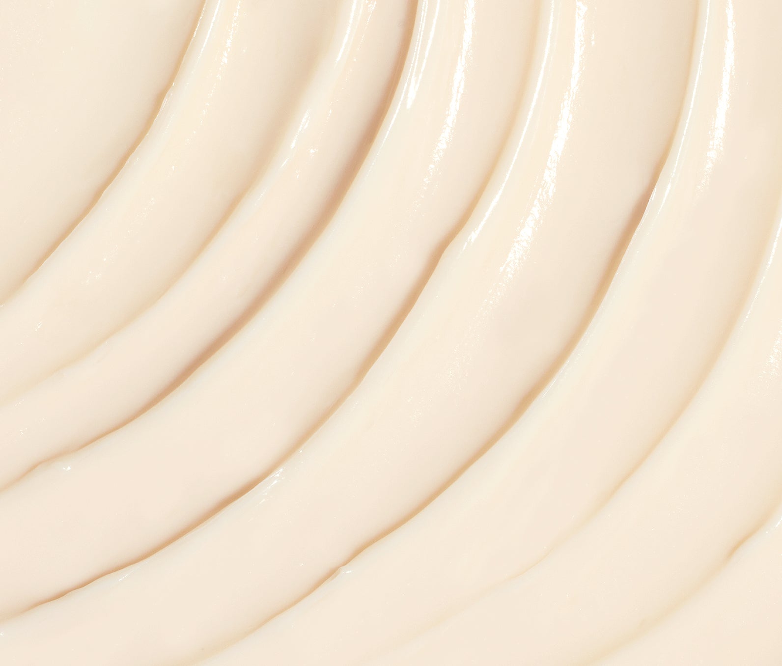 Close up of the off-white creamy texture of Ursa Major Alpine Rich Cream.