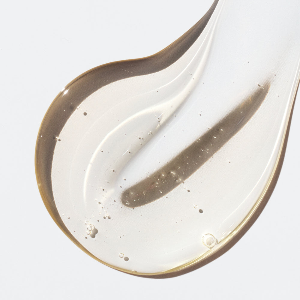 Translucent liquid showcasing glossy texture on a white background.