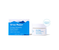 eye cream jar and carton on white with an "improved formula" badge