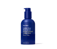 Blue bottle of Ursa Major Golden Hour Body Serum on a white background
