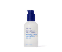 White Ursa Major Milky Cleanser bottle with blue pump on a white background