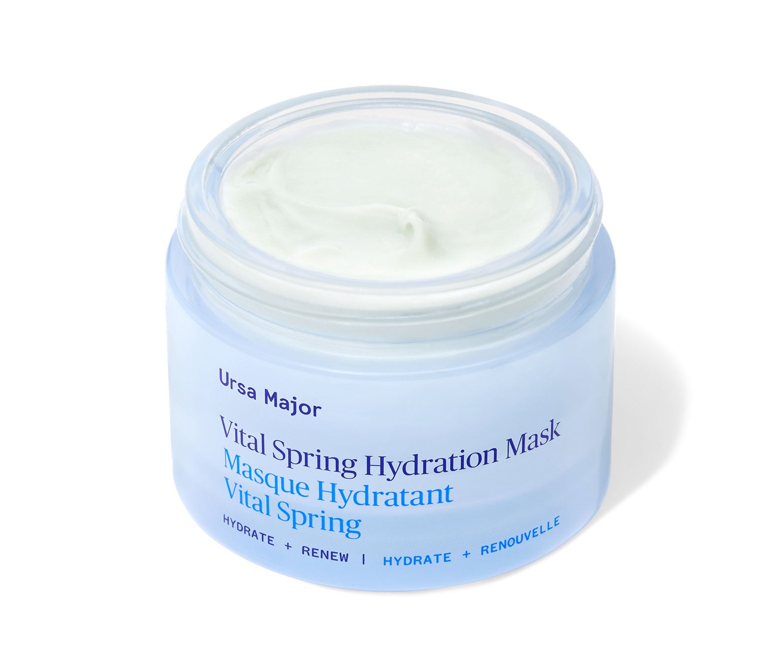 Opened jar of Ursa Major Vital Spring Hydration Mask, revealing a creamy beige product inside, set on a white background